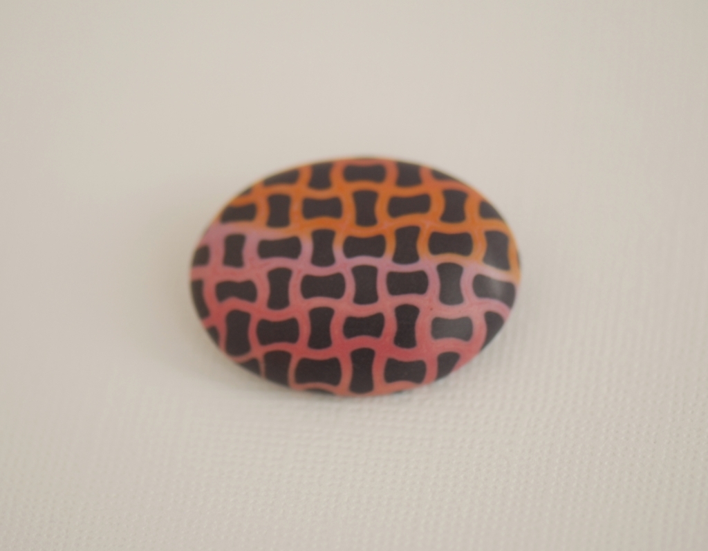 spalvota rankų darbo segė